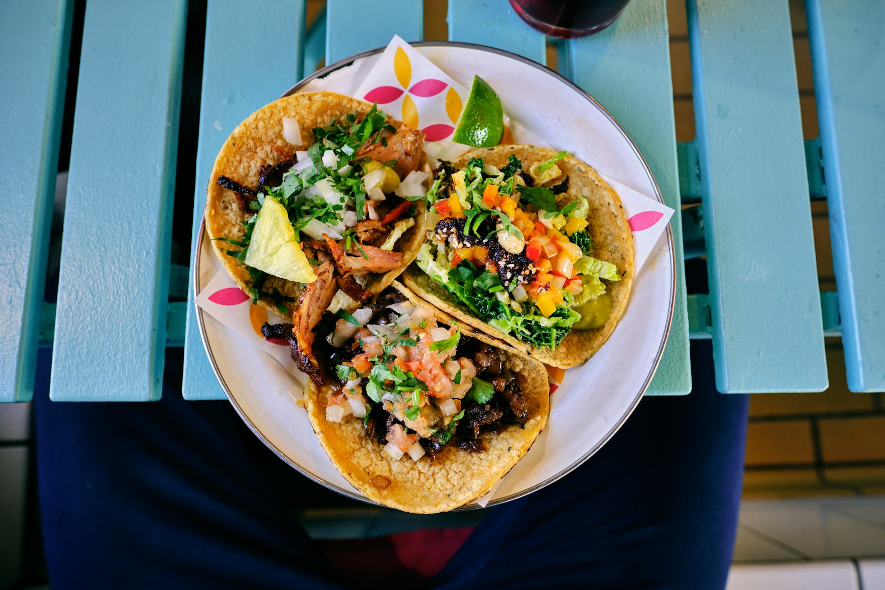 Three tacos on a plate at Sol Cantina