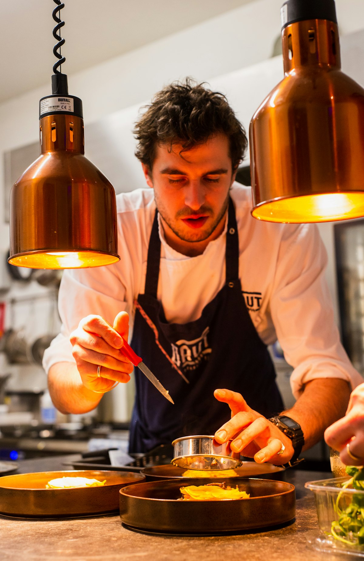 Kitchen lead plating at Sol Cantina